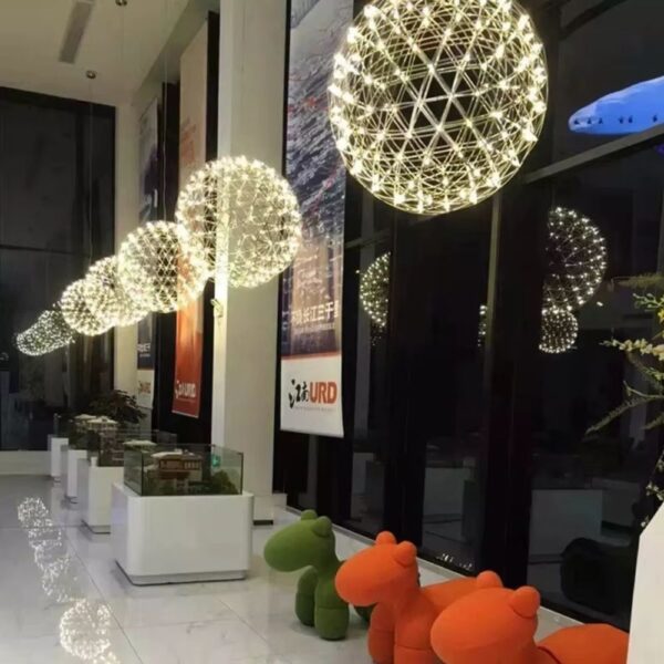 Lustre boule dorée en acier inoxydable
