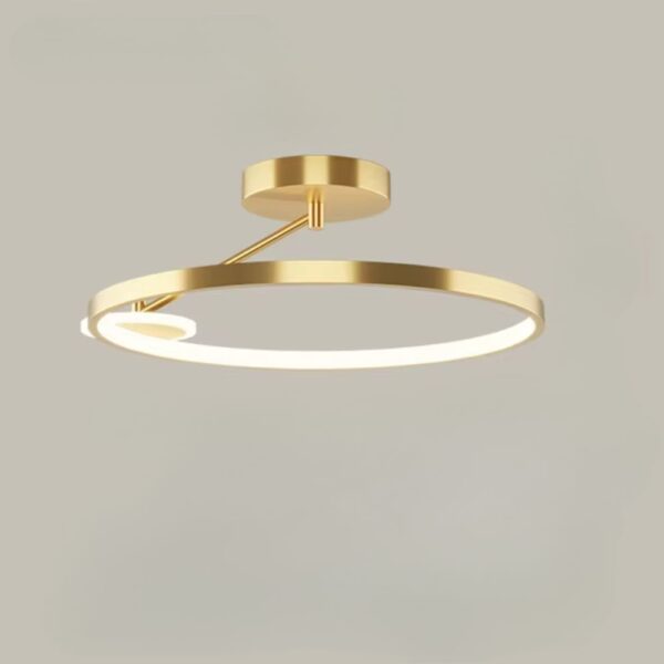 Lustre laiton moderne et épuré sur fond gris